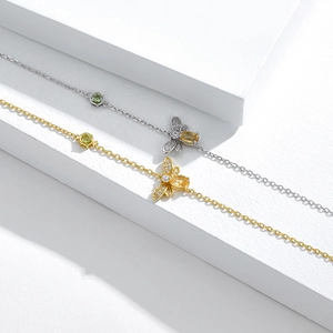 Elegant s925 silver bee bracelet in gold and silver finish with sparkling gemstones