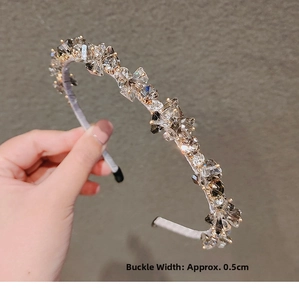 Detail showing the 0.5cm champagne gold beaded headband with luxury crystal inlay
