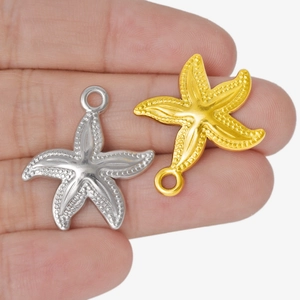 Macro view of gold and silver starfish pendants in 304 stainless steel for DIY jewelry