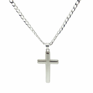 Macro shot of 925 sterling silver cross pendant with Cuban chain on white background