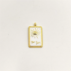 Golden sun tarot card pendant with white enamel and The Sun engraving for jewelry