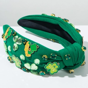 Detail of green Saint Patrick's Day headband with LUCK clover and emerald rhinestones