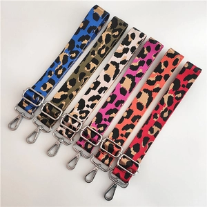 Detail of adjustable leopard print bag straps in six colors with silver metal buckles