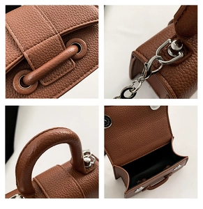 Detail shots of brown lychee grain leather handbag with silver hardware and neat stitching