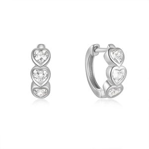 Detailed close-up of 925 sterling silver heart hoop earrings with clear crystals