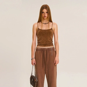Vintage brown cotton camisole top and matching joggers with cross print on a studio model