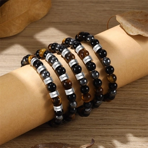 Customized men's beaded bracelet with tiger eye stones and engraved stainless steel names