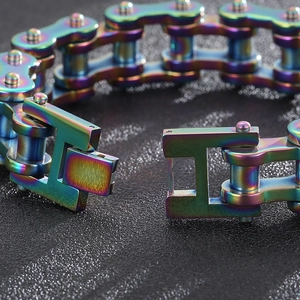 Rainbow stainless steel bike chain bracelet with heavy punk style and secure fold-over clasp