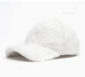 Detail shot of the plush white faux rabbit fur texture on this winter baseball cap