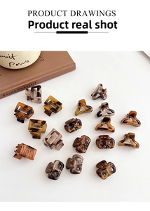 Detailed set of leopard print mini hair claws in various geometric resin shapes
