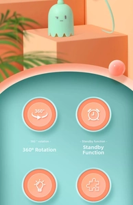 Close-up of mint green electronic cat toy featuring 360-degree rotation and standby mode