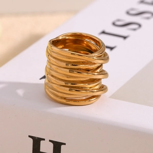 Macro detail of high-gloss 18K gold plated multi-layer layered wrap ring for women