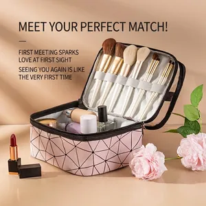 Pink quilted PU makeup bag with brush slots and large storage for travel toiletries