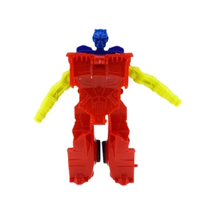 Detail of red and yellow transformation robot toy with blue head and black wheels