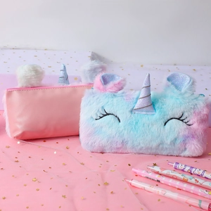 Detailed view of unicorn plush pencil case featuring sequins and rainbow fur textures