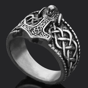 Detailed close-up of Mjolnir Thor Hammer vintage silver ring with Celtic knots