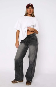 Detailed full-body view of grey high-waist straight-leg jeans with white T-shirt and sneakers