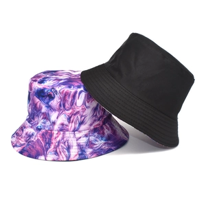 Tie-dye and solid black summer bucket hats for outdoor sun protection and stylish travel
