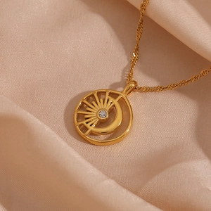 18K gold plated stainless steel necklace featuring a hollow sun and moon pendant with zircon