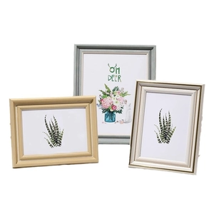 Three-piece ivory white and wood grain minimalist photo frame set with floral art prints