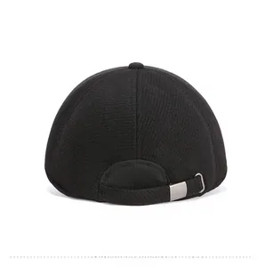 Rear view of black thermal baseball cap showing adjustable strap and silver metal buckle