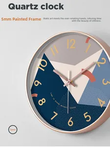 Detail showing the 5mm rose gold painted metal frame of the silent quartz wall clock