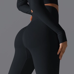 Detail of high waist seamless yoga pants with peach scrunch butt and ribbed waistband