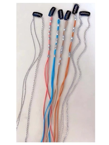 Detail of denim style braided hair ropes with metal chains, colorful beads and black clips