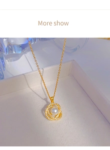 Detailed view of camellia pearl pendant with micro-pave zircons on gold chain