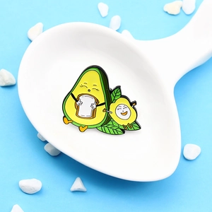 Cartoon avocado hugging toast enamel pin brooch made of alloy on a decorative spoon