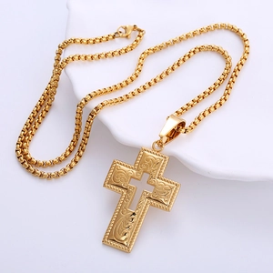 Gothic 18k gold plated stainless steel cross pendant with intricate floral engravings