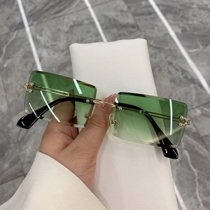 Frameless square sunglasses with green gradient lenses and gold metal temples for women