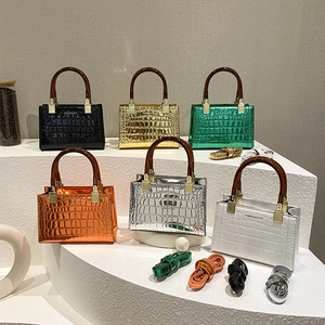 Glossy patent leather mini crossbody bags with crocodile pattern in six vibrant colors