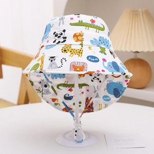 Detail of kids cartoon animal bucket hat featuring adjustable drawstring and soft sun protection