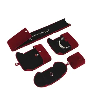 Red velvet jewelry packaging set including necklace, bracelet and ring boxes with silver snap