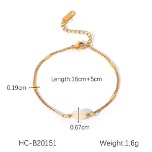 Detail view of gold stainless steel bracelet with natural oval pink stone and lobster clasp