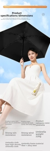 Detail of a compact 5-fold sun umbrella showing 220g lightweight frame and UV black coating