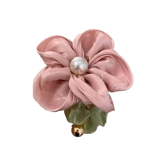 Elegant pink satin flower hair scrunchie with white pearl and green leaf accent