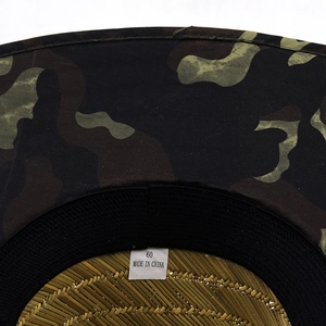 Detail of size 60 label and camouflage brim texture on men's outdoor sun hat