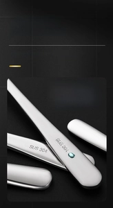 Detailed close-up of SUS 304 stainless steel cutlery handle with brushed metal finish