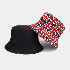 Detail of reversible bucket hat showing Union Jack print and solid black canvas fabric