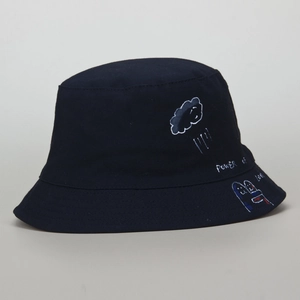 Detail showing the Power of Love hand-painted graffiti on a black cotton bucket hat