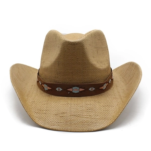 Classic western straw cowboy hat with ethnic embroidered leather band on white background