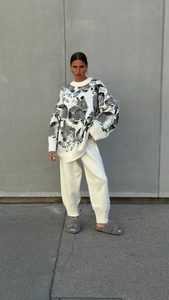 Detailed texture of oversized rabbit knit sweater and matching gray lounge pants set
