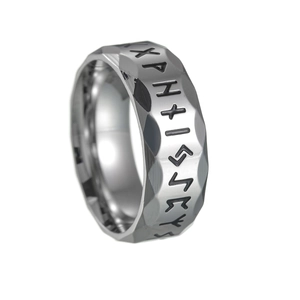 Close-up of vintage titanium steel ring with Nordic Runes and hammered texture finish