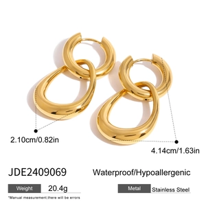 Detail showing waterproof hypoallergenic golden double hoop earrings with dimensions 4.14cm