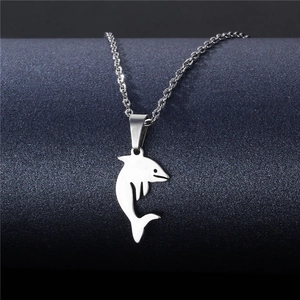 Polished stainless steel dolphin pendant necklace on a deep blue starry background