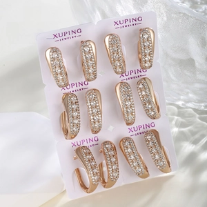 Set of 6 rose gold hoop earrings with white zircon pavé on white display card