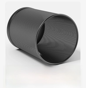 Detail of hollow black metal mesh wastebasket with smooth rim for home and office