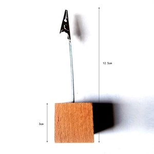Detail of wooden base photo holder with crocodile clip showing 12.5cm height and wood grain